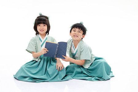 男孩女孩学习国学传统知识古书高清图片素材