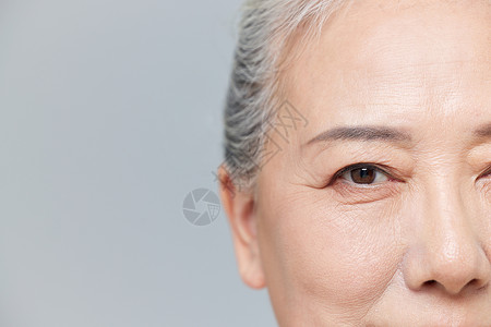 眼部皱纹老年女性眼部特写背景