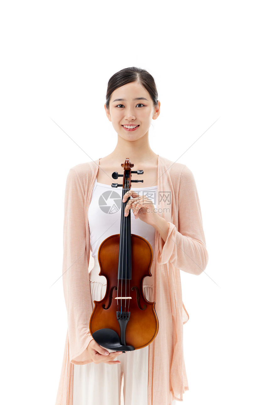 手拿小提琴的青年女性图片
