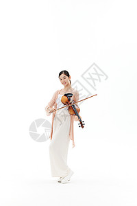 拉小提琴的女性演奏家背景图片