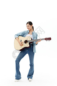 文艺活力女青年弹吉他背景图片