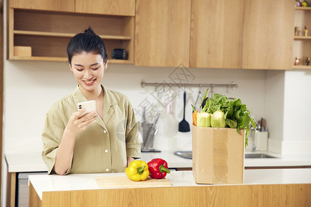 居家美女线上团购蔬菜背景图片