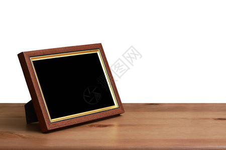 桌子上的照片框白色的背黑锅与背景图片