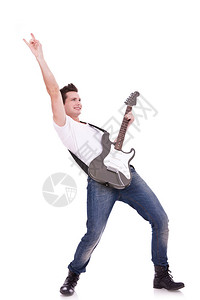 带着吉他摇滚手势的摇滚巨星在白色背图片