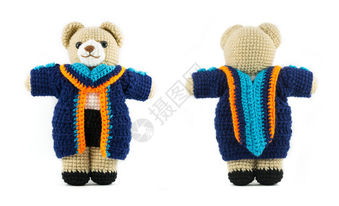 手制编织的编织长袍玩具熊娃图片
