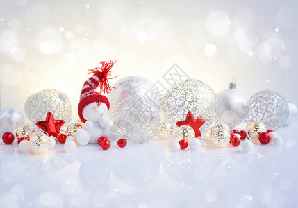 圣诞节或新年背景配有节日装饰雪人图片