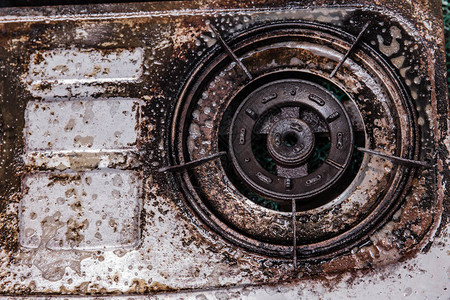 肮脏的油脂蹩脚的旧煤气灶不干净图片