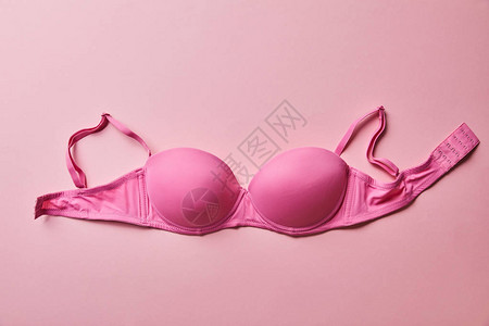 粉色背景上的胸罩背景图片