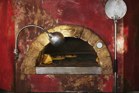 餐厅厨房的泥瓦烤炉近镜头里图片