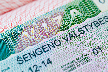 在护照的申根签证印章背景图片