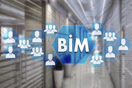 建筑信息模型带有办公室模糊背景的触摸屏上的BIM建筑信息模型B图片