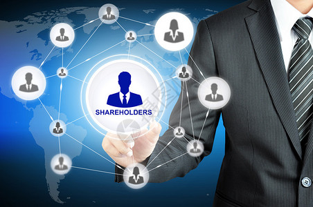 在虚拟屏幕上用网络连成的人物图标显示SHAREHOL图片