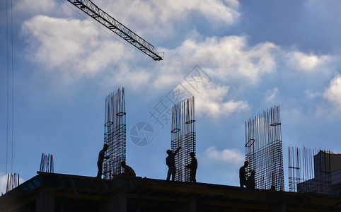 工人和建筑施工人员的轮廓图Silho背景图片