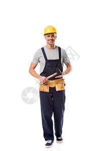 手带工具带的建筑工人握着锤子在图片