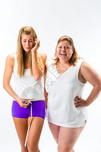 瘦胖妇女腰部用胶带测量腰部图片