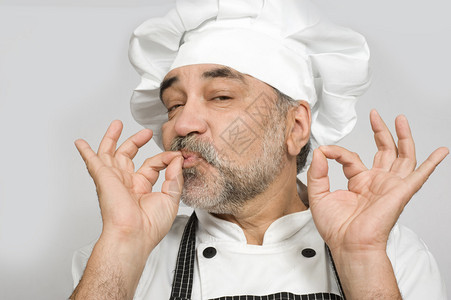 隔离有吸引力的厨师背景图片