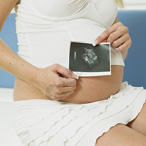 孕妇和她的孩子的超声波图图片