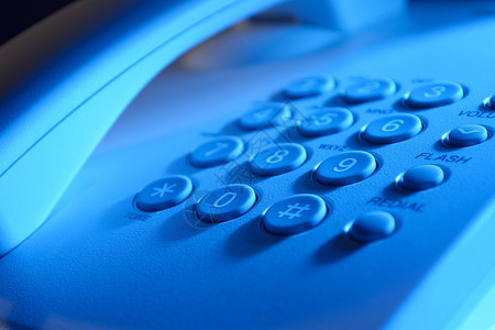 配有拨号码和在蓝光固定线路电话仪器上按功能按图片