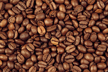 烤咖啡豆的特写背景图片