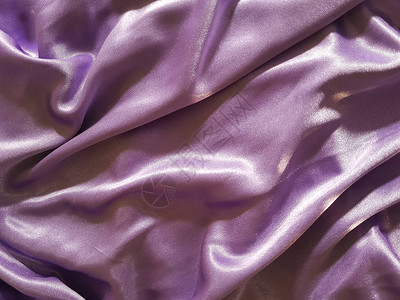 丝绸紫色面料背景图片