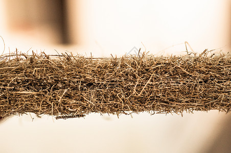椰子壳用于生产床垫的磨碎的椰子壳纹理背景图片