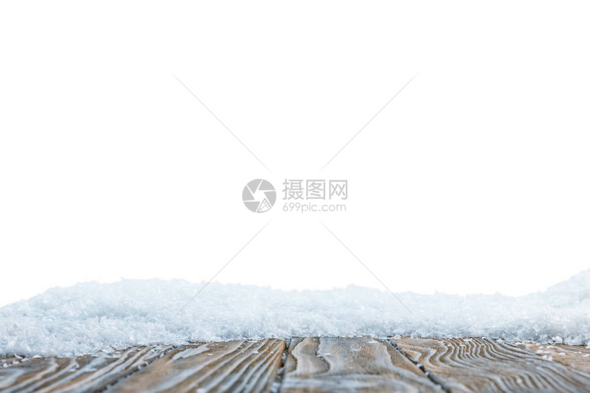 白雪覆盖的条纹木板有选择焦点白图片