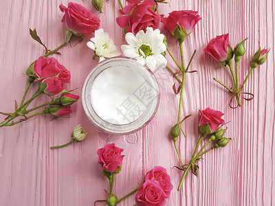 奶油化妆品粉红色木玫瑰图片