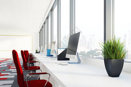 开放式办公室配有白色电脑桌红色椅子和灰色红色和白色的地毯特写3图片