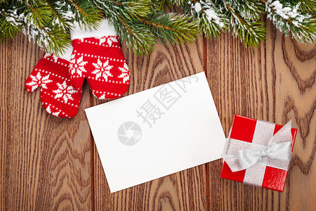 圣诞贺卡或照片框和手套图片