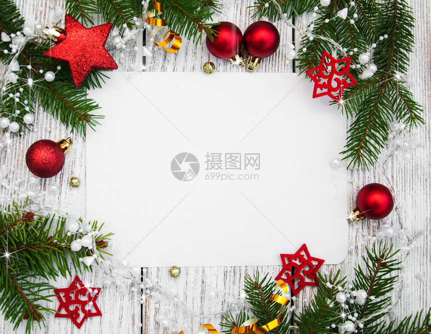 圣诞节背景木制桌上的装饰和图片