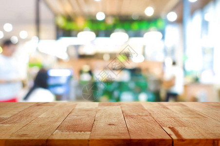 模糊咖啡馆restaurant内地背景上的木板顶部可用于显背景