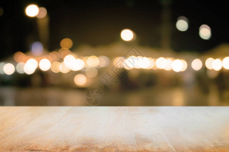 夜街市场背景的空木桌图片