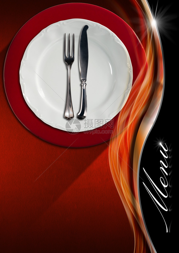 红色和橙色天鹅绒背景上有银色餐具叉子和刀图片