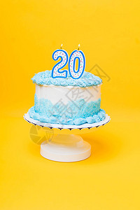 白蛋糕上面有蓝色装饰背景图片