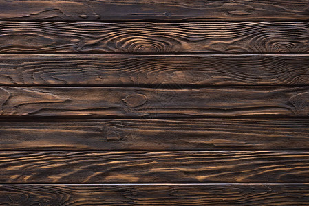 在棕色背景绘的木水平板条图片