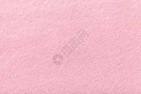 羊皮织物的浅粉色垫底背景图片