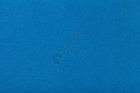 羊皮织物的浅蓝色垫底背景图片