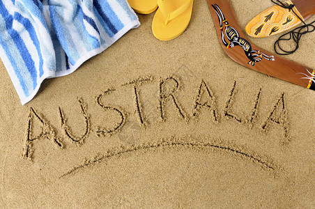 澳大利亚海滩背景与回旋镖毛巾和人字拖背景图片