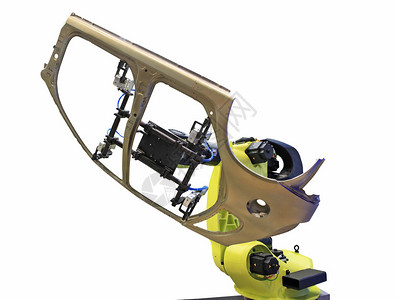 生产线上的黄色机器人焊接汽车图片