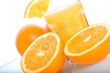 橙子和一杯橙汁高清图片