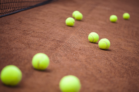钜惠大满贯棕色绳子上的网球背景