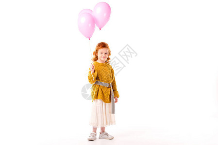 带着粉色气球的快乐红发孩子图片