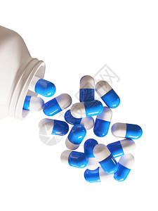 彩色药丸白色背景中的药瓶图片