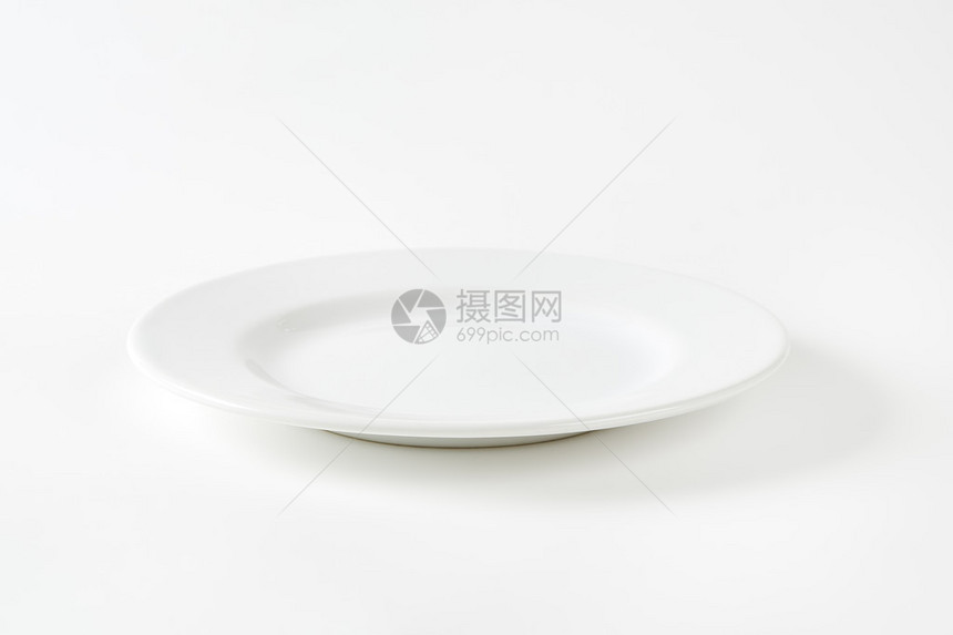 带卷边的空白瓷餐盘图片