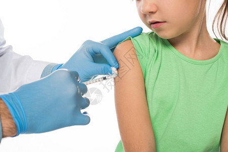 儿童肩上接种疫苗的儿科医生切片观察图片