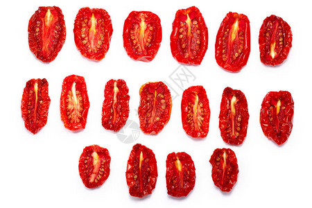 太阳或干红的番茄一半顶部视图不同形状和大小种子上升缩小路图片