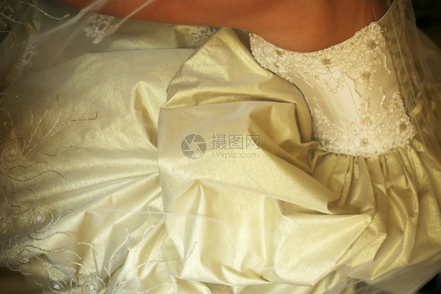 新娘美丽的金色礼服图片