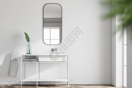 白色浴室水槽站在斯堪的纳维亚风格的浴室内部图片