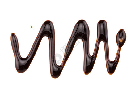 甜巧克力糖浆在白色图片