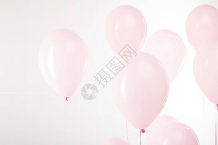 背景与白色装饰粉红色气球图片